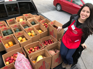 A FARMER’S PERSPECTIVE ON FOOD RESCUE CFR INTERVIEW WITH TYLER BUTLER image3 Woman with food donations